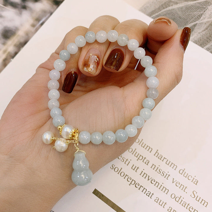 Bracelet en jade vert clair avec amulette Wu Lou - Karma et Moi