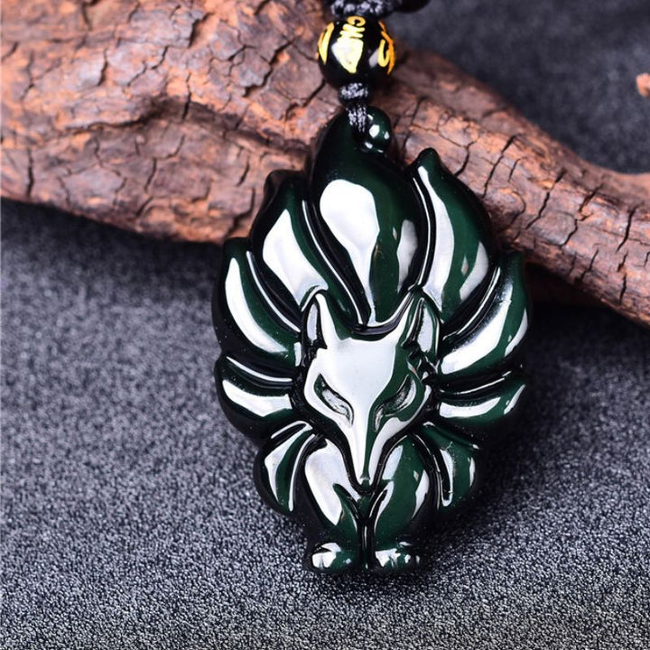 Collier d'obsidienne arc-en-ciel représentant le renard à neuf queues - Karma et Moi