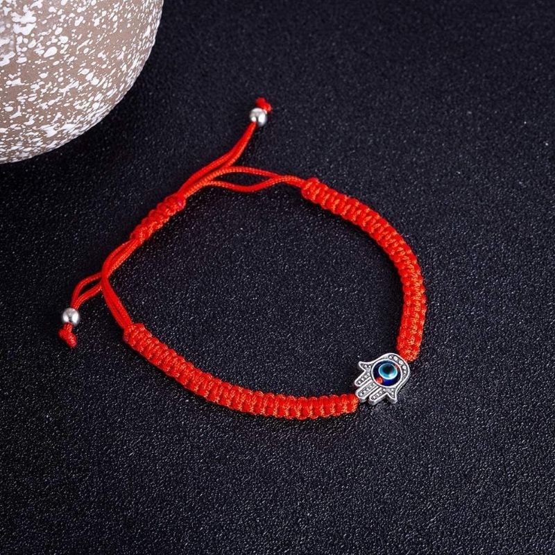 Bracelet en fils rouges avec main de Hamsa - Protection contre le mauvais œil - Karma et Moi