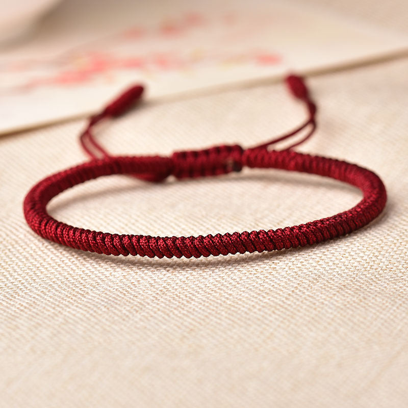 Bracelet porte-bonheur bouddhiste à noeuds tibétains - Karma et Moi